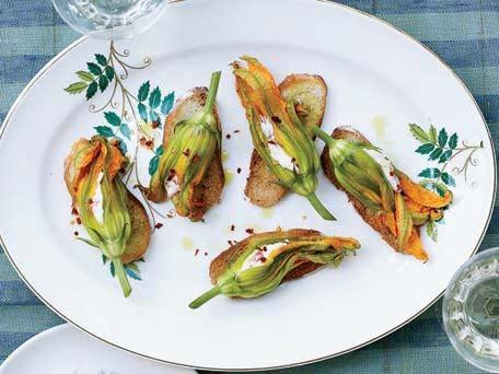 <strong>Get the <a href="http://www.huffingtonpost.com/2011/10/27/squash-blossoms-with-pime_n_1059208.html" target="_blank">Squash Blossoms with Pimento Ricotta recipe</a></strong>