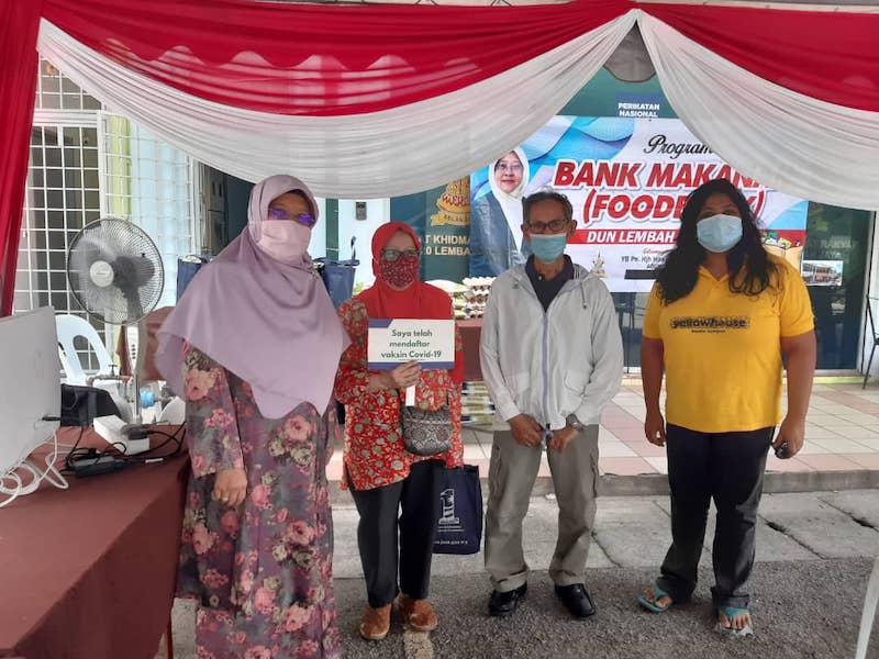 Yellow House Kuala Lumpur decided to open up Covid-19 vaccine registration counters for the elderly after learning of the low statistics of people registering for it on the news. — Picture courtesy of Yellow House KL