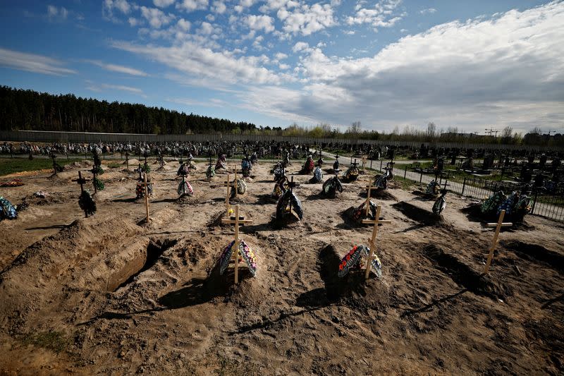 FILE PHOTO: A view of new graves for people killed during Russia's invasion of Ukraine, at a cemetery in Bucha