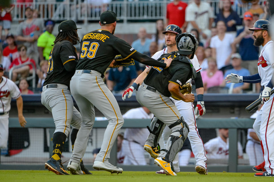 ATLANTA, GA - JUNE 10: Atlanta Braves third baseman Josh Donaldson (20) has words with Pittsburgh Pirates starting pitcher Joe Musgrove (59) after being hits a by a pitch during the MLB baseball game between the Pittsburgh Pirates and the Atlanta Braves on June 10, 2019 at SunTrust Park in Atlanta, GA. (Photo by John Adams/Icon Sportswire via Getty Images)