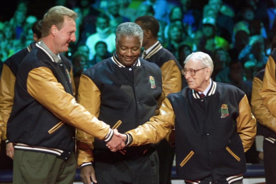 Larry Bird, Oscar Robertson and John Wooden were honored at halftime, along with 47 other Indiana basketball greats.