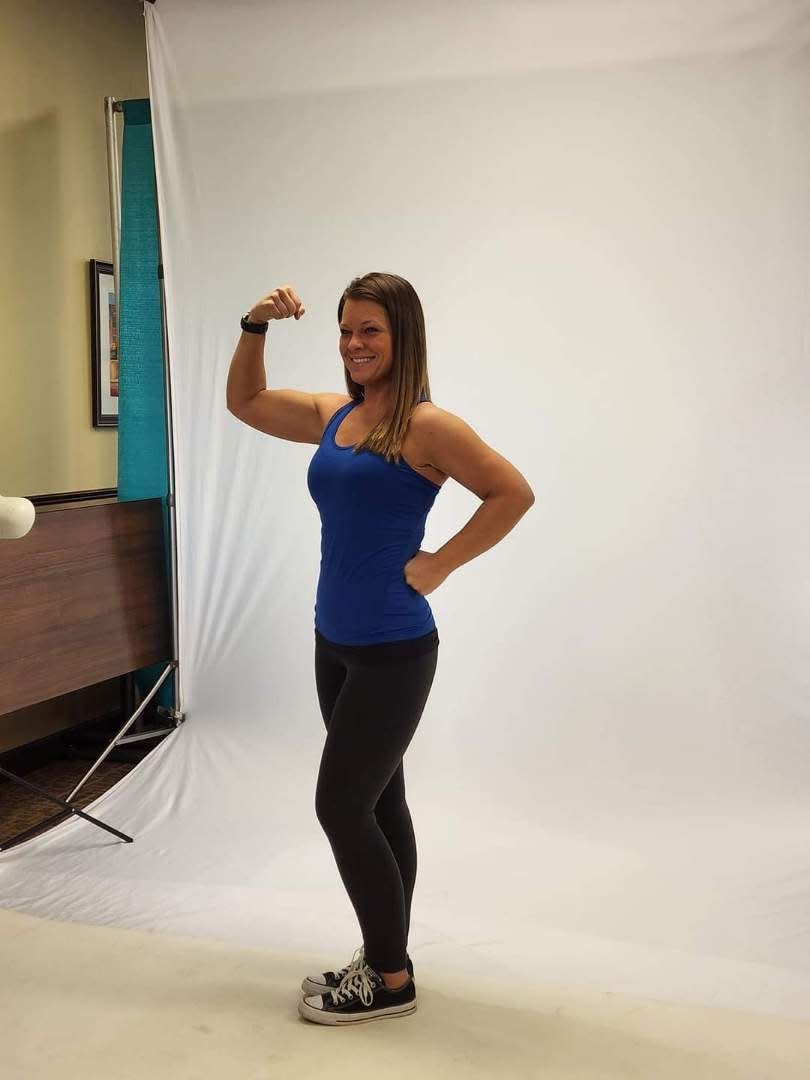 Ashley Smits, a veteran of the Air Force, poses in a photoshoot at the I Am Not Invisible event in Manitowoc, as seen Saturday, Jan. 28.