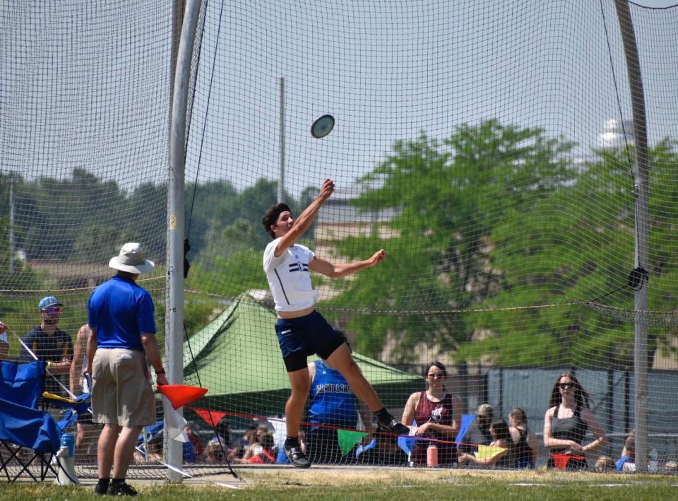 Academy junior Dominic Scharer took third in discus to earn all-state honors.