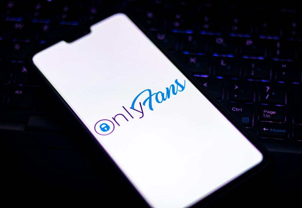 OnlyFans logo on a mobile phone