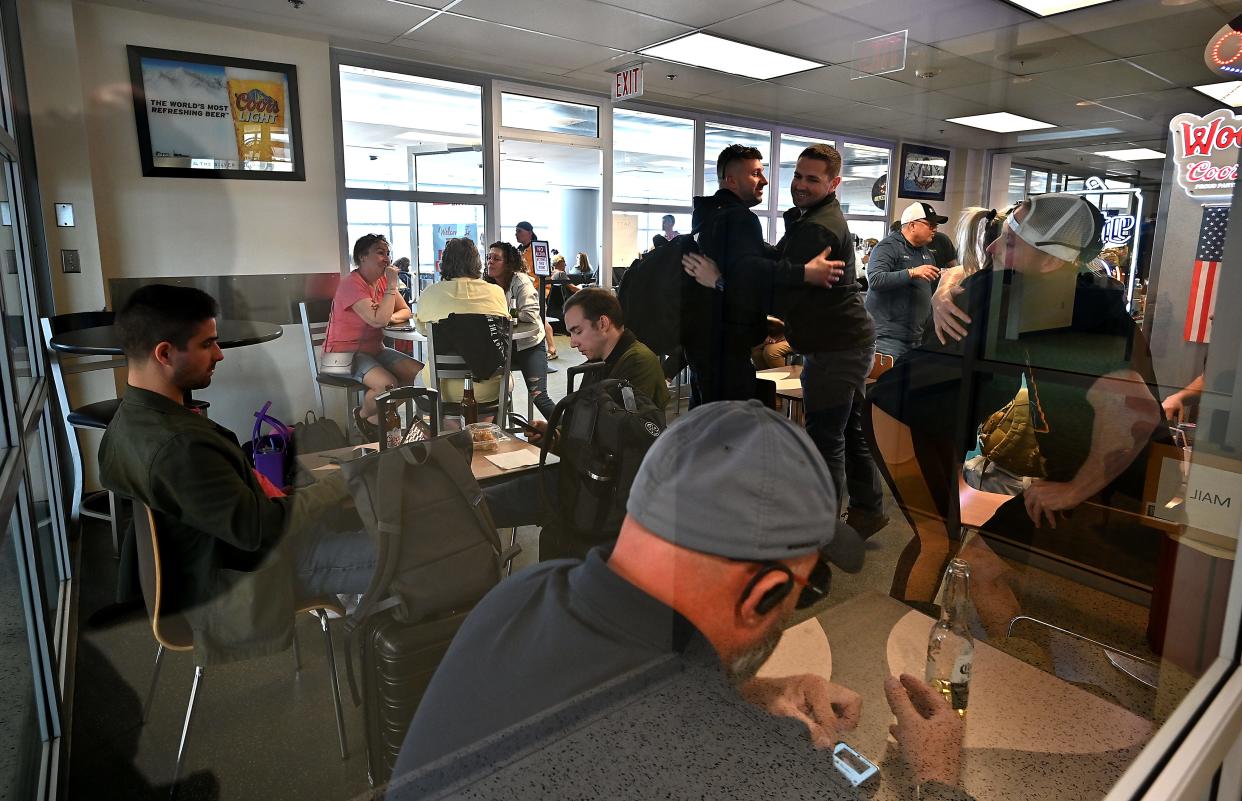 WORCESTER - The bar and waiting areas were crowded on Thursday at Worcester Regional Airport.