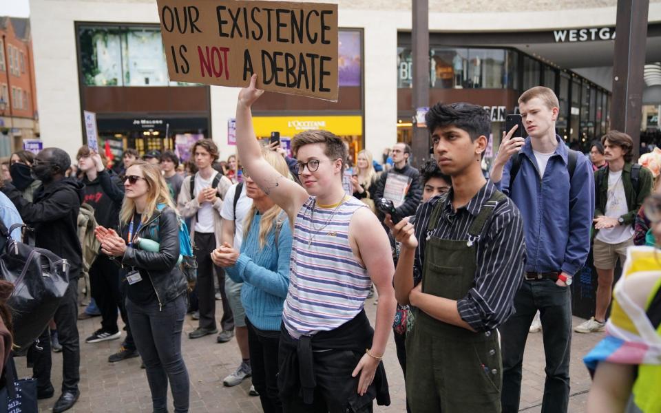 Trans activists gather ahead of a protest of a talk by Prof Kathleen Stock at the Oxford Union - Jonathan Brady/PA