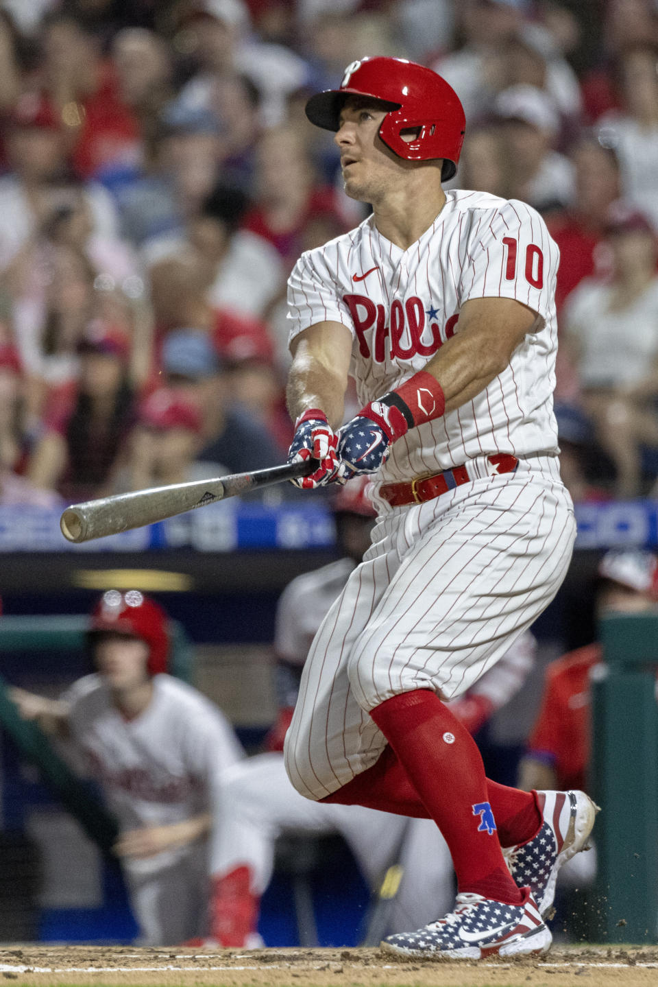 Philadelphia Phillies' J.T. Realmuto watches his two-run home run during the sixth inning of a baseball game against the St. Louis Cardinals, Sunday, July 3, 2022, in Philadelphia. (AP Photo/Laurence Kesterson)