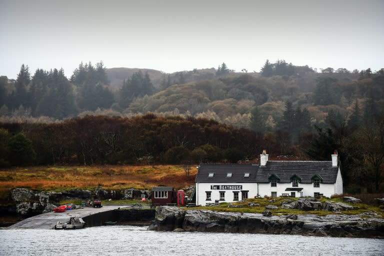 The Boathouse Cafe is seen across the water on the Isle of Ulva, the first port of call for visitors to the island