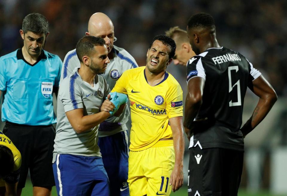 Pedro limped off in agony after a late collision with the goalkeeper. (Reuters )