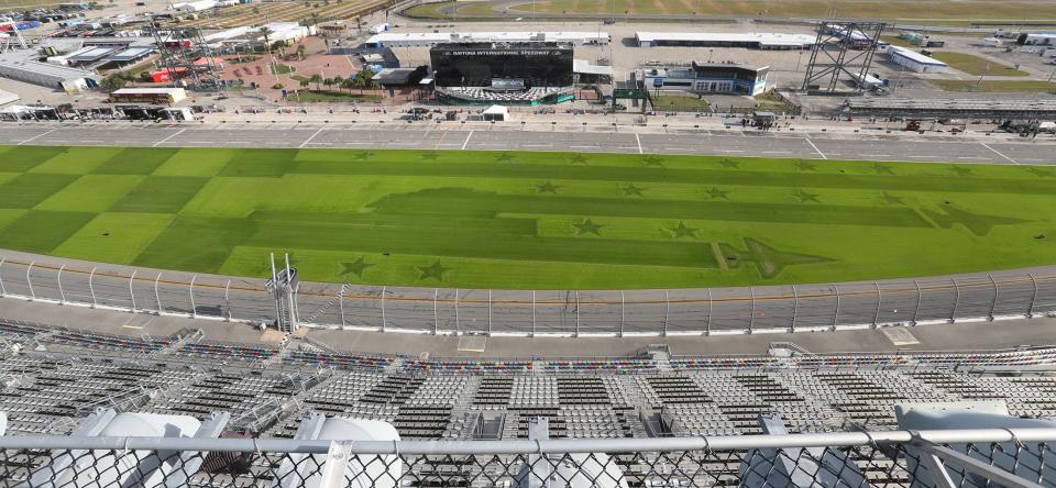 Daytona International Speedway grandstands., Tuesday December 5, 2023 overlooking the grass in the trioval, that's been called the ball field for years, the speedway is working to host home games of the Jacksonville Jaguars in a few years when the Jaguars renovate their stadium.