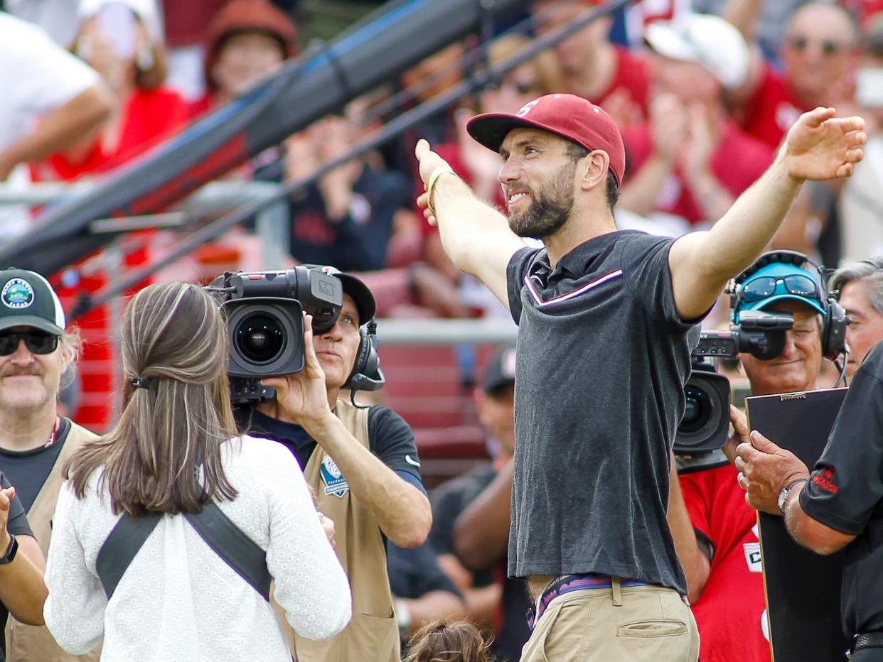 Andrew Luck attends a Stanford football game against USC.