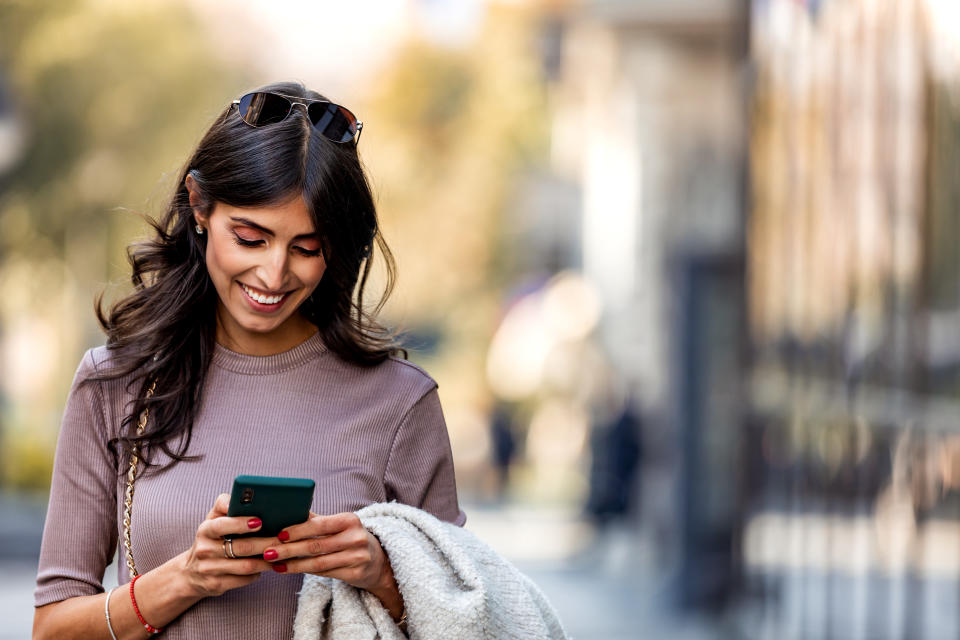 Woman on mobile phone (Getty Images)