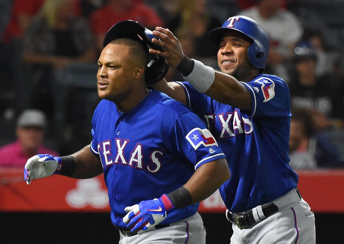 WATCH THE HAIR! Miguel Cabrera ruffles Adrian Beltre's feathers