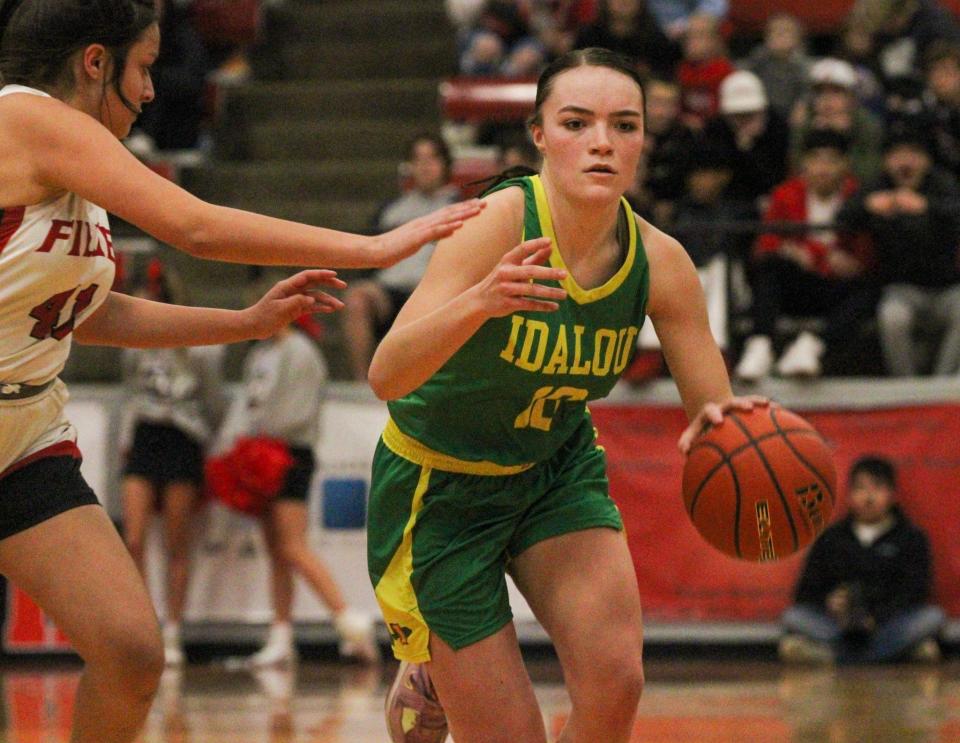 Idalou's Lily Moyers dribbles against Shallowater during a District 2-3A girls basketball game on Friday, January 13, 2023 at Shallowater.