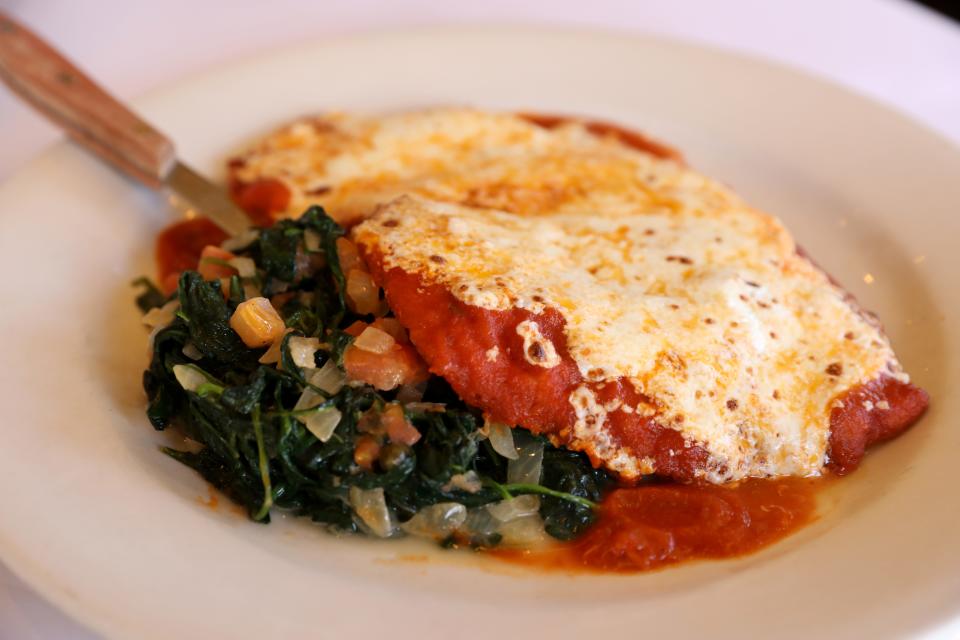 The chicken parm, served with spinach, at Rosie's Bistro Italiano in Bronxville Nov. 30, 2023.