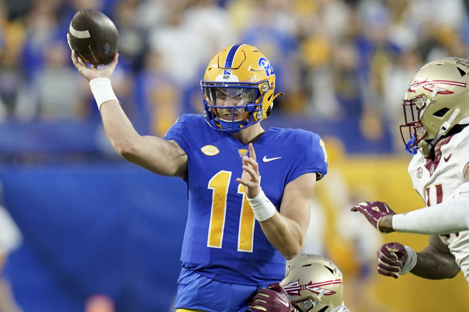 Pittsburgh quarterback Christian Veilleux (11) looks to throw a pass during the second half of an NCAA college football game against Florida State in Pittsburgh, Saturday, Nov. 4, 2023. (AP Photo/Matt Freed)