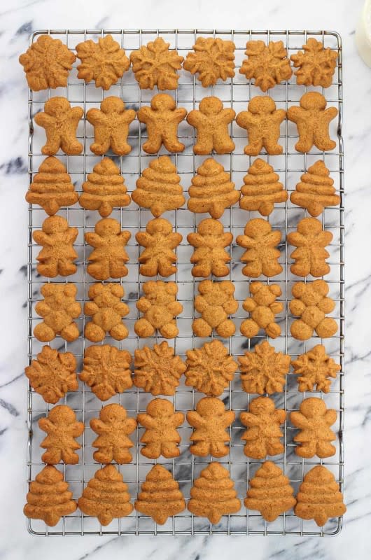 <p>My Sequined Life</p><p>Gingerbread spritz cookies are buttery and spiced with classic gingerbread flavors in this easily shaped version of gingerbread cookies. This flavored spritz cookie recipe makes more than enough for a crowd.</p><p><strong>Get the recipe: <a href="https://www.mysequinedlife.com/gingerbread-spritz-cookies/" rel="nofollow noopener" target="_blank" data-ylk="slk:Gingerbread Spritz Cookies;elm:context_link;itc:0;sec:content-canvas" class="link rapid-noclick-resp">Gingerbread Spritz Cookies</a></strong></p>