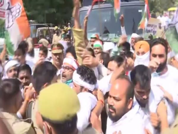 UP Congress President Ajay Kumar Lallu being detained by police in Lucknow on Monday. [Photo/ANI]