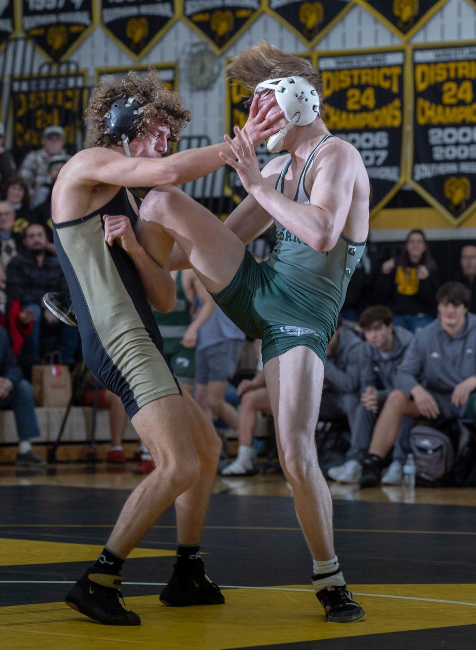 Southern's Wyatt Stout (left) recorded a come-from-behind 4-2 win over Delbarton's Trevor Jones in the 132-pound bout. Delbarton won the match 48-12.