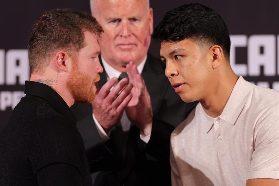 Canelo Alvarez and Jaime Munguia shake hands at a press conference at the Beverly Hills Hotel in March (Getty Images)