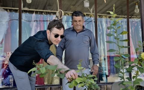 Tom Massey, creator of the Lemon Tree Trust garden, at Domiz refugee camp to meet gardeners supported by the Lemon Tree Trust - Credit: DIRK-JAN VISSER