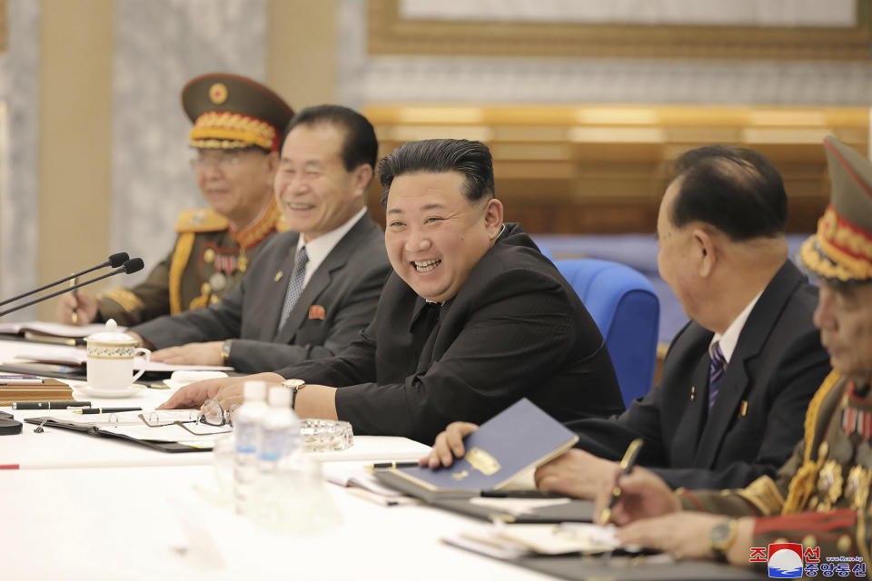 In this photo provided by the North Korean government, North Korean leader Kim Jong Un, center, attends a meeting of the Central Military Commission of the ruling Workers' Party in Pyongyang, North Korea Wednesday, June 22, 2022. Independent journalists were not given access to cover the event depicted in this image distributed by the North Korean government. The content of this image is as provided and cannot be independently verified. Korean language watermark on image as provided by source reads: "KCNA" which is the abbreviation for Korean Central News Agency. (Korean Central News Agency/Korea News Service via AP)