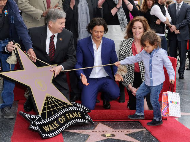 Axelle/Bauer-Griffin/FilmMagic Orlando Bloom and his son Flynn Bloom attend the ceremony honoring Orlando Bloom with a Star on The Hollywood Walk of Fame on April 2, 2014 in Hollywood, California