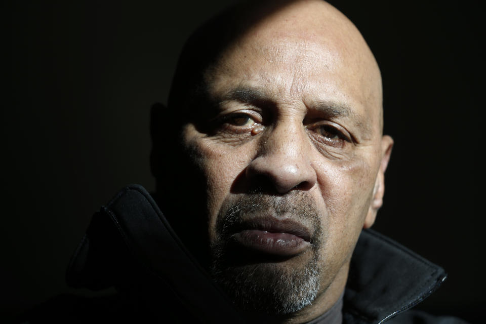 In this Thursday, Nov. 6, 2018 photo, Richard Walker, an Atlantic Coast Pipeline opponent, poses at a community center in Richmond, Va. Walker says his great-grandfather bought a 25 acre homestead in Union Hill, the site of a proposed compressor station, for $15 in 1885 as a freed slave, said Dominion Energy is engaged in "environmental racism." (AP Photo/Steve Helber)