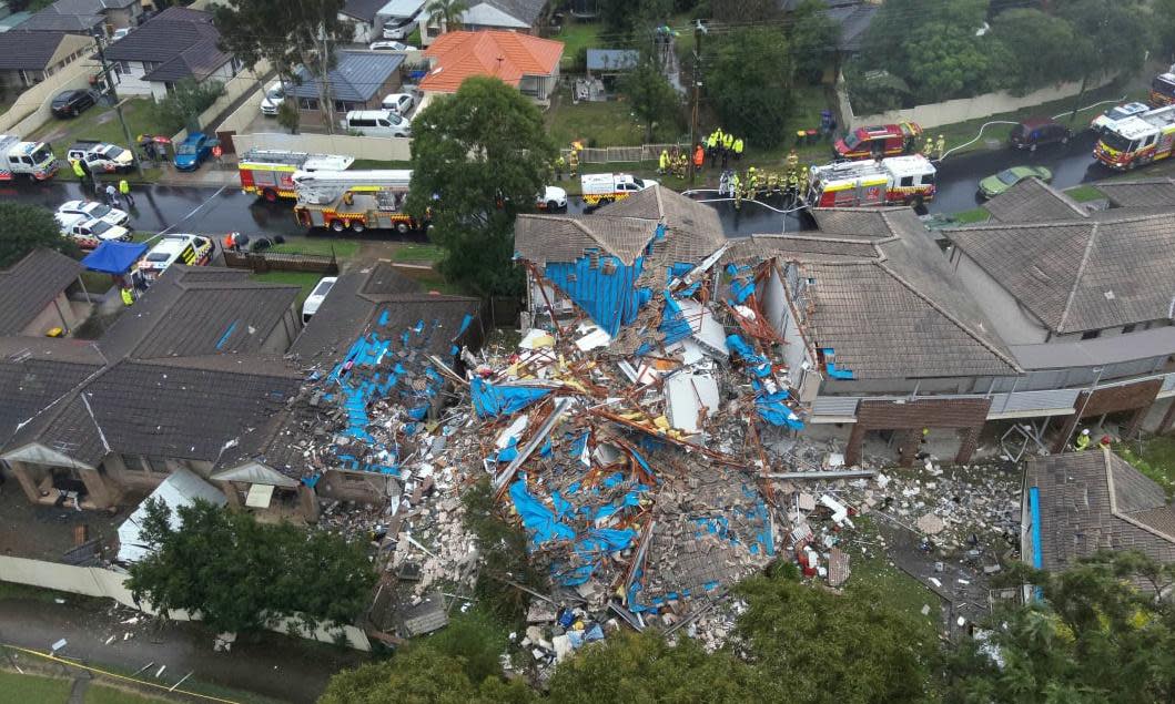 <span>An aerial view of emergency services on the scene following an explosion at a townhouse in Whalan, in Sydney's west, on 2 June.</span><span>Photograph: Fire and Rescue NSW</span>