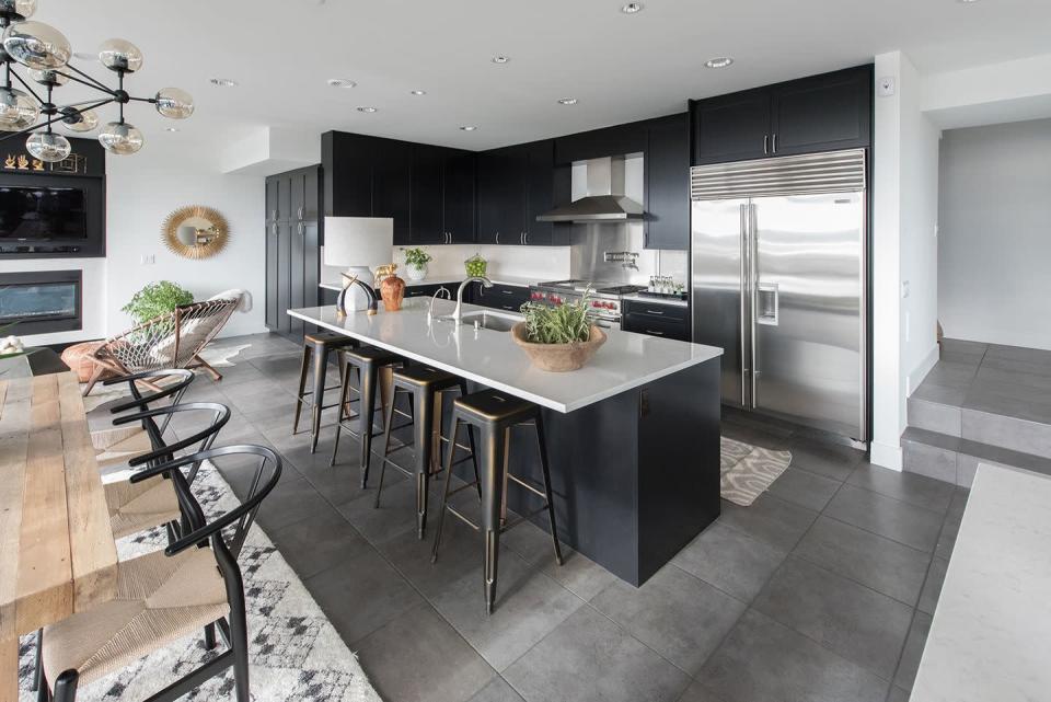 <p>"We’re going to see lots of black this year, especially in kitchens. Edgy but so classic, black cabinets pair perfectly with anything from warm wood shelves to crisp white backsplashes. I love pitch black, but if you want a toned-down version, try <a href="https://urldefense.com/v3/__https:/www.farrow-ball.com/paint-colours/off-black__;!SxXtNzbPoJo!1krUP8WUIAZq_u__Khvcztiwf2IERn1x7_oiIbE6xZhpkuLM4k1T542ho63sbC4JkGWb$" rel="nofollow noopener" target="_blank" data-ylk="slk:Off" class="link ">Off</a>-<a href="https://urldefense.com/v3/__https:/www.farrow-ball.com/paint-colours/off-black__;!SxXtNzbPoJo!1krUP8WUIAZq_u__Khvcztiwf2IERn1x7_oiIbE6xZhpkuLM4k1T542ho63sbC4JkGWb$" rel="nofollow noopener" target="_blank" data-ylk="slk:Black by Farrow & Ball" class="link ">Black by Farrow & Ball</a> for some drama no matter your style of kitchen." — Briana Nix of <a href="https://www.decorist.com/designers/50513/briana-nix/" rel="nofollow noopener" target="_blank" data-ylk="slk:Decorist" class="link ">Decorist</a></p>