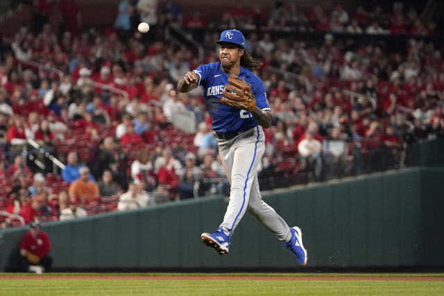 Kansas City Royals shortstop Adalberto Mondesi throws out St. Louis Cardinals' Dylan Carlson on a ground out during the sixth inning of a baseball game Tuesday, April 12, 2022, in St. Louis. (AP Photo/Jeff Roberson)
