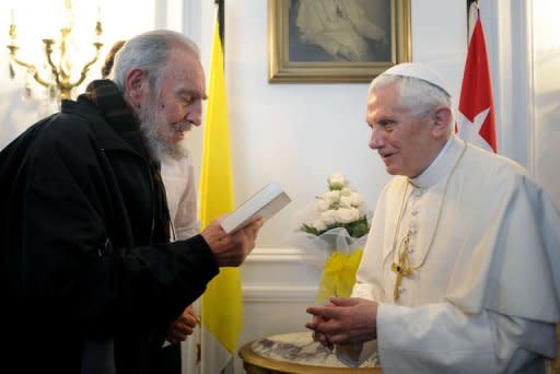 This handout picture released by the Vatican Press Office shows Pope Benedict XVI with Fidel Castro (L) during a meeting in Havana. Pope Benedict XVI met with Cuba's revolutionary icon Fidel Castro Wednesday, the last day of a trip to bolster the Roman Catholic church's relationship with the Communist government