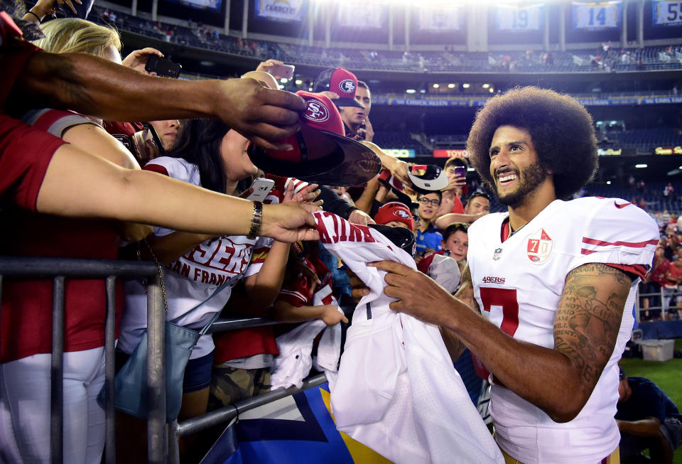 San Francisco 49ers quarterback Colin Kaepernick signs autographs for fans after a 31-21 win over the San Diego Chargers on Sept. 1, 2016. (Photo: Harry How via Getty Images)