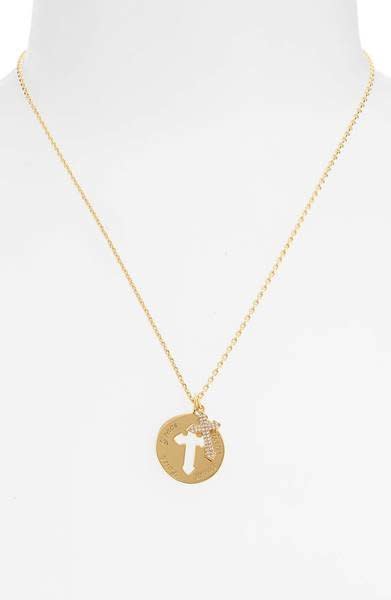 Get it at <a href="https://shop.nordstrom.com/s/lulu-dk-cross-disc-pendant-necklace/4929739?origin=category-personalizedsort&amp;fashioncolor=GOLD%2F%20CLEAR" target="_blank">Nordstrom</a>, $84.