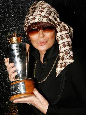 Chrissy Amphlett poses with the Divinyls Handicap Cup trophy during the 2007 Melbourne Cup Carnival.