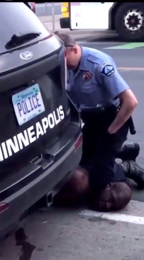 Video captured by a bystander shows a Minneapolis police officer pressing his knee into Floyd's neck. (Photo: Facebook)