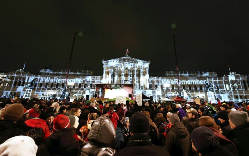 Protesters take part in a rally against right-wing extremism and racism called by the organizations Black Voices Austria, Fridays for Future and the Platform for a Humane Asylum Policy, in front of the parliament in Vienna. Tobias Steinmaurer/APA/dpa