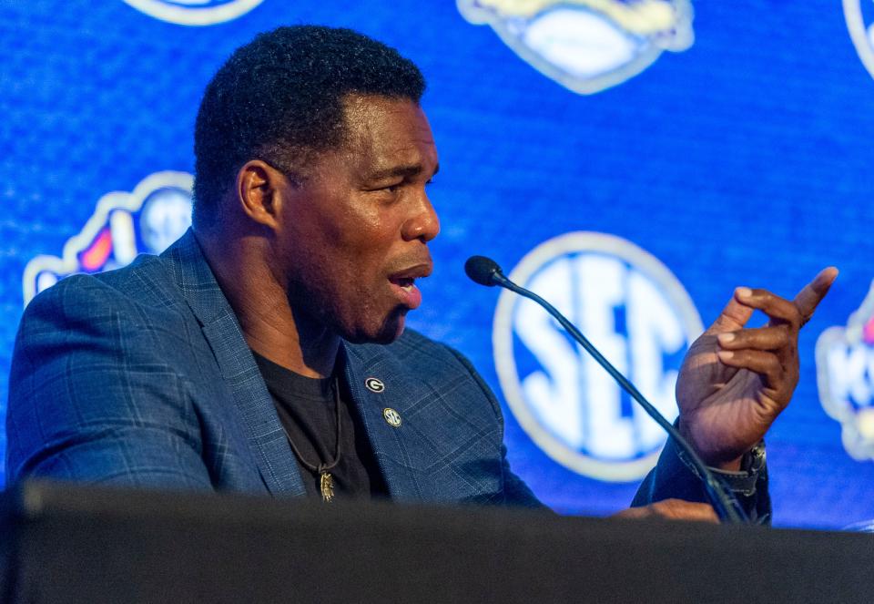 Herschel Walker speaks during the SEC legends panel in 2019.