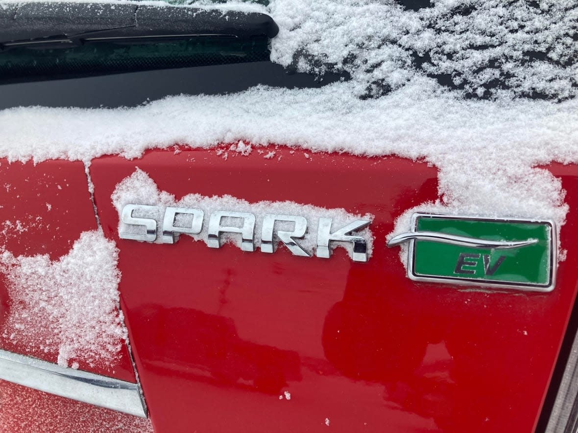 The photo of the Chevrolet Spark owned by the Yellowknife Car Share Co-op. The group says the vehicle meets its needs in the city. The N.W.T. government is looking at a network of charging stations that would make it easier to drive EVs between Yellowknife and the Alberta border.  (Liny Lamberink/CBC - image credit)
