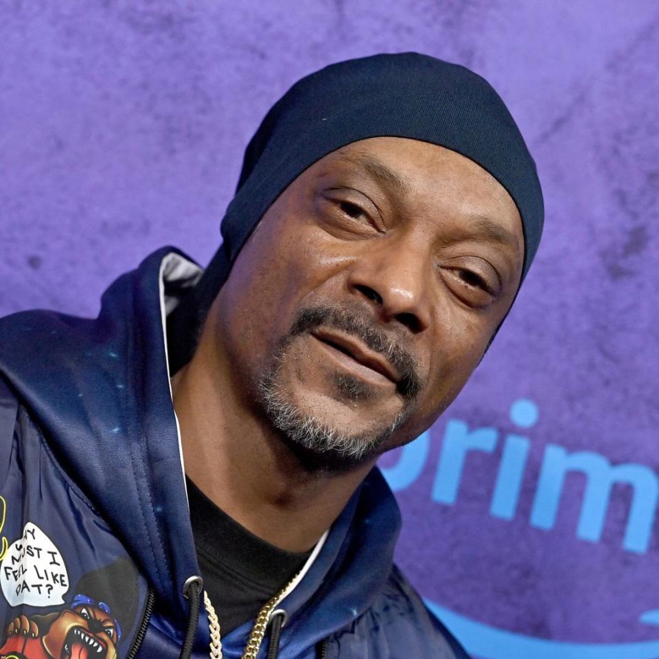 Devastated Snoop Dogg shares unseen family photo just days after brother's death aged 44