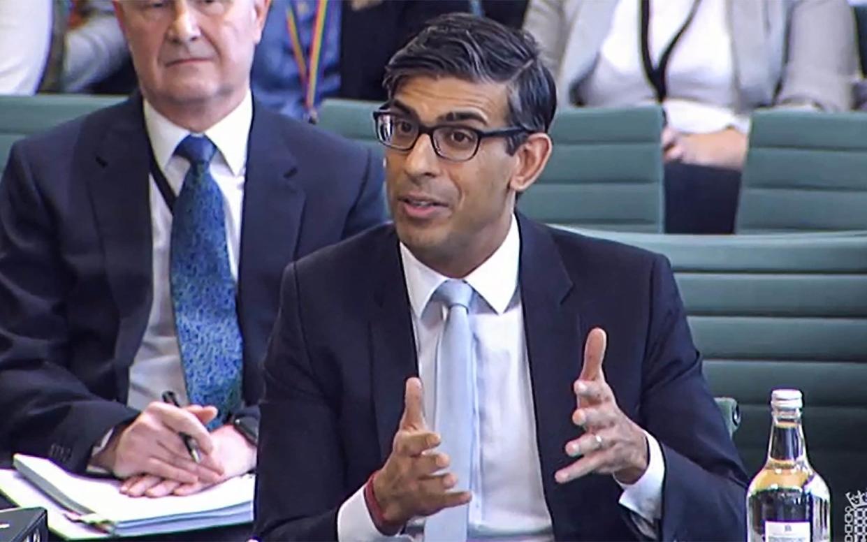 A video grab from footage broadcast by the UK Parliament's Parliamentary Recording Unit (PRU) shows Britain's Prime Minister Rishi Sunak, gesturing as he answers questions by members of the Parliament of the Liaison Committee - Parliamentary Recording Unit/AFP via Getty Images