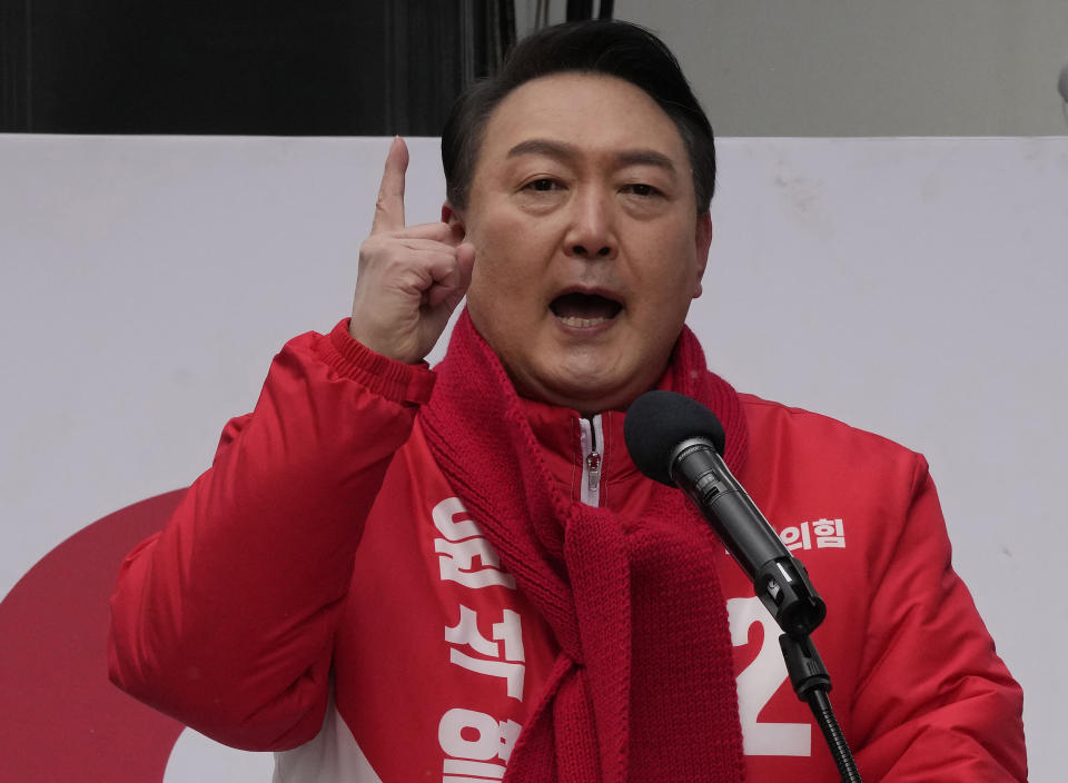 Yoon Suk Yeol, the presidential candidate of the main opposition People Power Party, speaks during a presidential election campaign in Seoul, South Korea on Feb. 15, 2022. An unusually bitter election season in South Korea culminates on Wednesday, March 9 when tens of millions of voters pick their next president. The winner, who will be sworn into office in May and serve one five-year term, will face crucial challenges as the leader of a fast-aging nation that's grappling with economic inequalities, soaring debt and a growing North Korean nuclear threat. (AP Photo/Ahn Young-joon)