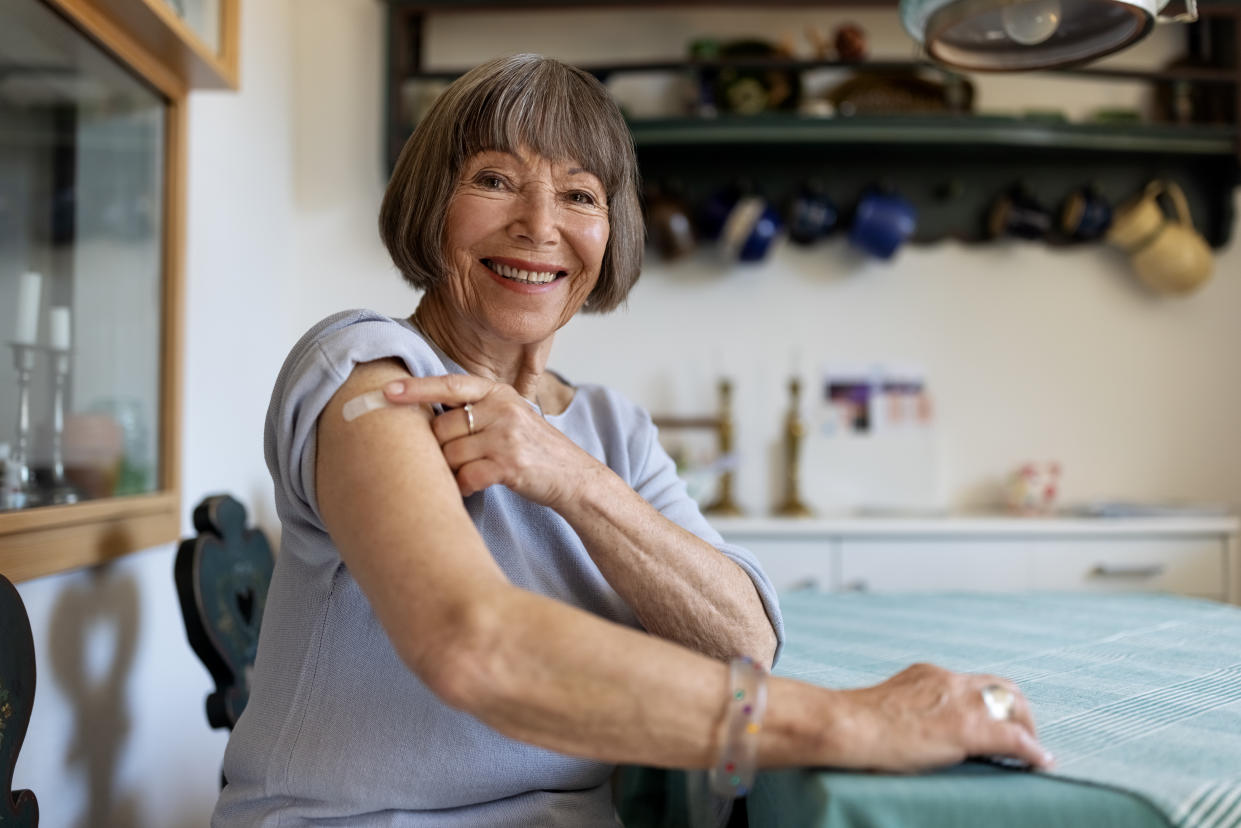 A woman who has returned home having had the flu shot. (Getty Images)