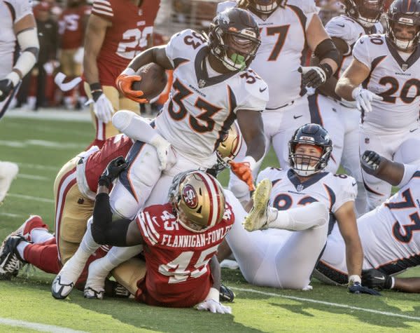 Running back Javonte Williams (33) and the Denver Broncos will face the Washington Commanders on Sunday in Denver. File Photo by Terry Schmitt/UPI