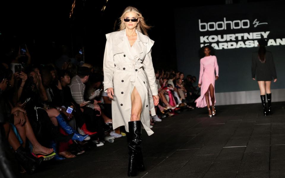 Models present creations by Boohoo X Kourtney Kardashian in New York last year - REUTERS/Caitlin Ochs