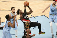 Portland Trail Blazers' Nassir Little (9) drives against Memphis Grizzlies defenders in the second half of an NBA basketball game Wednesday, April 28, 2021, in Memphis, Tenn. (AP Photo/Mark Humphrey)