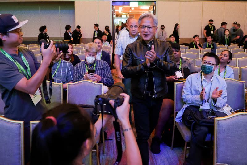 FILE PHOTO: Nvidia CEO Jensen Huang arrives at an event at COMPUTEX forum in Taipei