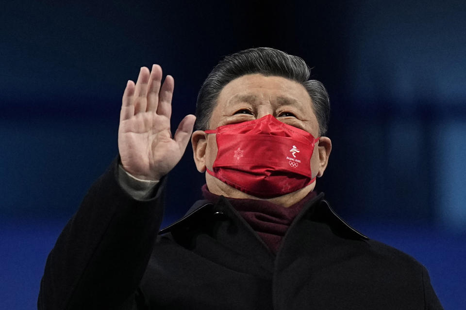 FILE - Chinese President Xi Jinping waves during the closing ceremony of the 2022 Winter Olympics on Feb. 20, 2022, in Beijing. The just-concluded Winter Olympics weren’t China's big event of the year, internally, at least. For the Communist Party, that comes this fall at a major meeting that will likely cement Xi Jinping's position as one of the nation's most powerful leaders in its seven decades of Communist rule. (AP Photo/Jae C. Hong, File)