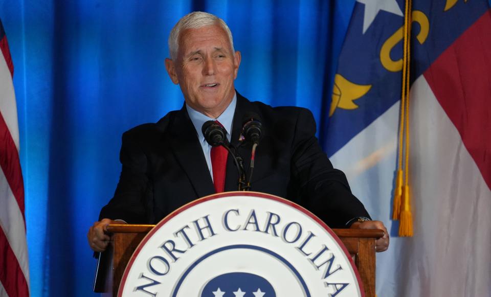 Former Vice President Mike Pence speaks to a crowd during the North Carolina Republican Party Convention at Koury Convention Center Saturday.