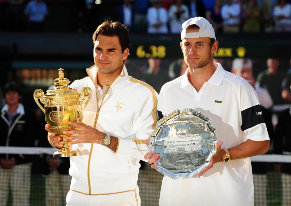 Roger Federer beat Andy Roddick over five sets in the 2009 Wimbledon final to surpass Pete Sampras’ record of 14 majors (Owen Humphreys/PA Archive) (PA Archive)